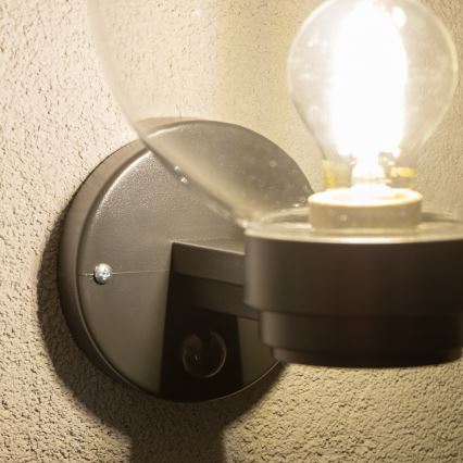 BRILAGI - Vanjsko zidno svjetlo s senzorom pokreta HARBOR 1xE27/40W/230V IP33 crno/prozirno