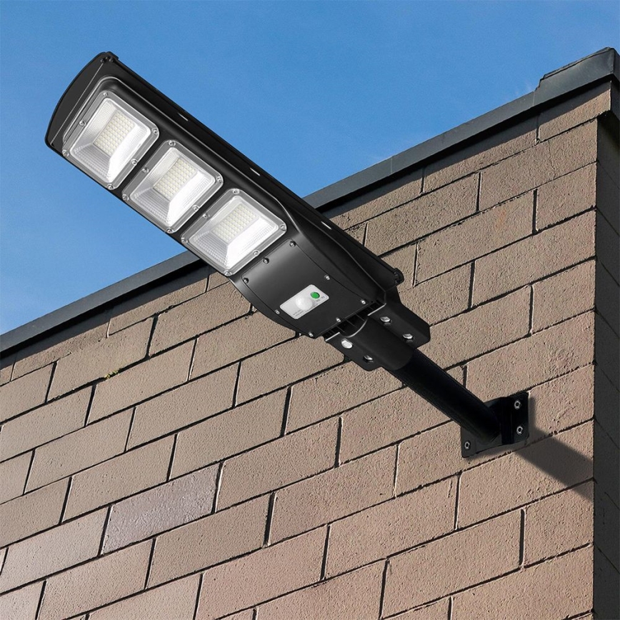 LED Prigušiva solarna ulična svjetiljka sa senzorom pokreta i dana/noći LED/12W/3,2V 6000K IP65 10000 mAh crna + daljinski upravljač