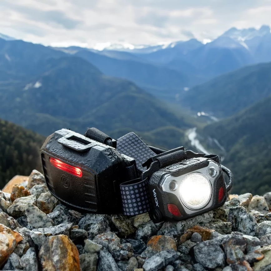 LED Prigušiva punjiva čeona svjetiljka sa senzorom s funkcijom powerbanka i crvenim svjetlom LED/10W/5V IP44 1200 lm 4000 mAh