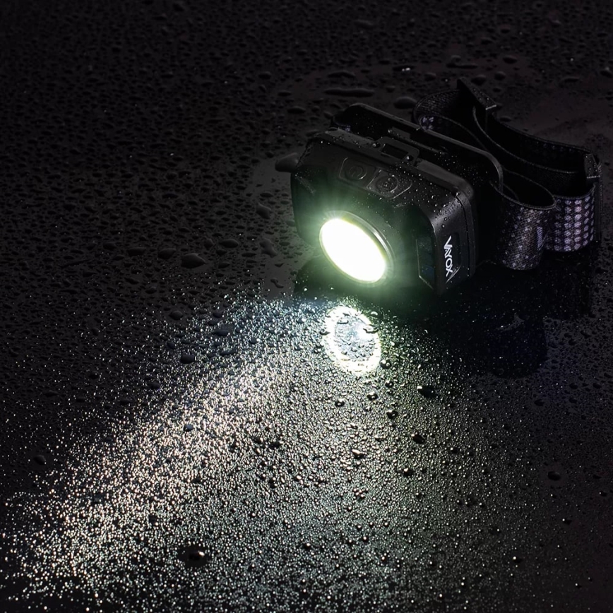 LED Prigušiva punjiva čeona svjetiljka sa senzorom i crvenim svjetlom LED/15W/5V IP66 430 lm 1800 mAh