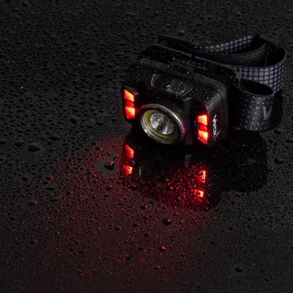 LED Prigušiva punjiva čeona svjetiljka sa senzorom i crvenim svjetlom LED/15W/5V IP66 430 lm 1800 mAh