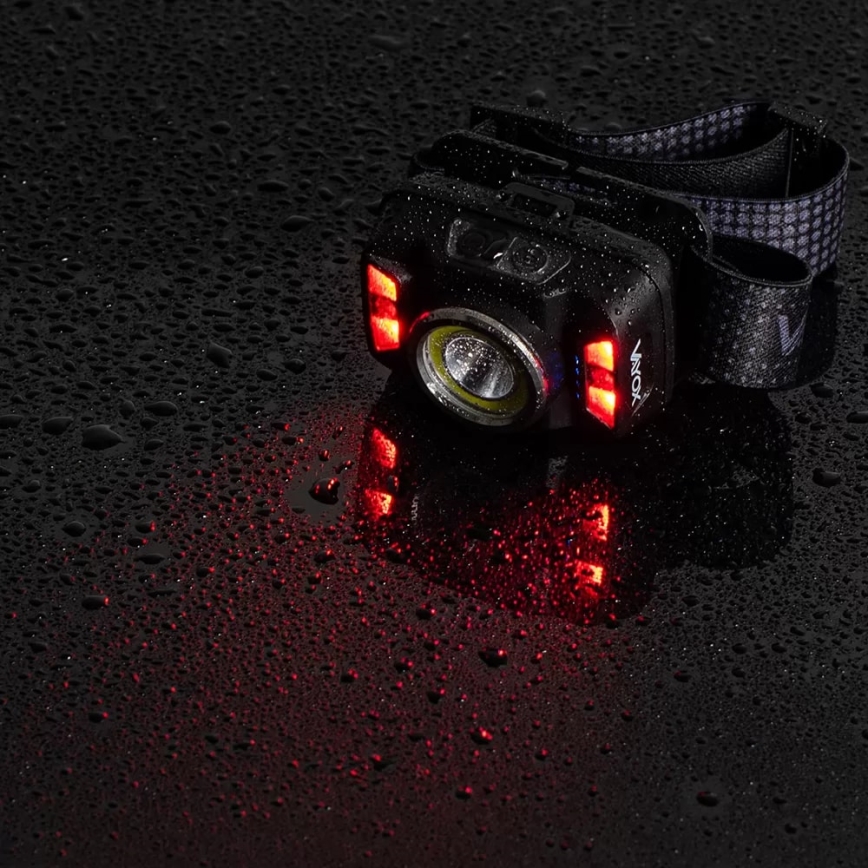 LED Prigušiva punjiva čeona svjetiljka sa senzorom i crvenim svjetlom LED/15W/5V IP66 430 lm 1800 mAh