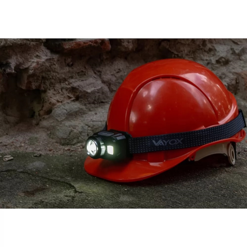 LED Prigušiva punjiva čeona svjetiljka sa senzorom i crvenim svjetlom LED/6W/5V/3xAAA IP44 500 lm 1200 mAh