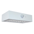 LED Solarna zidna svjetiljka sa senzorom LED/3W/3,7V 3000K/4000K IP65 1200 mAh bijela