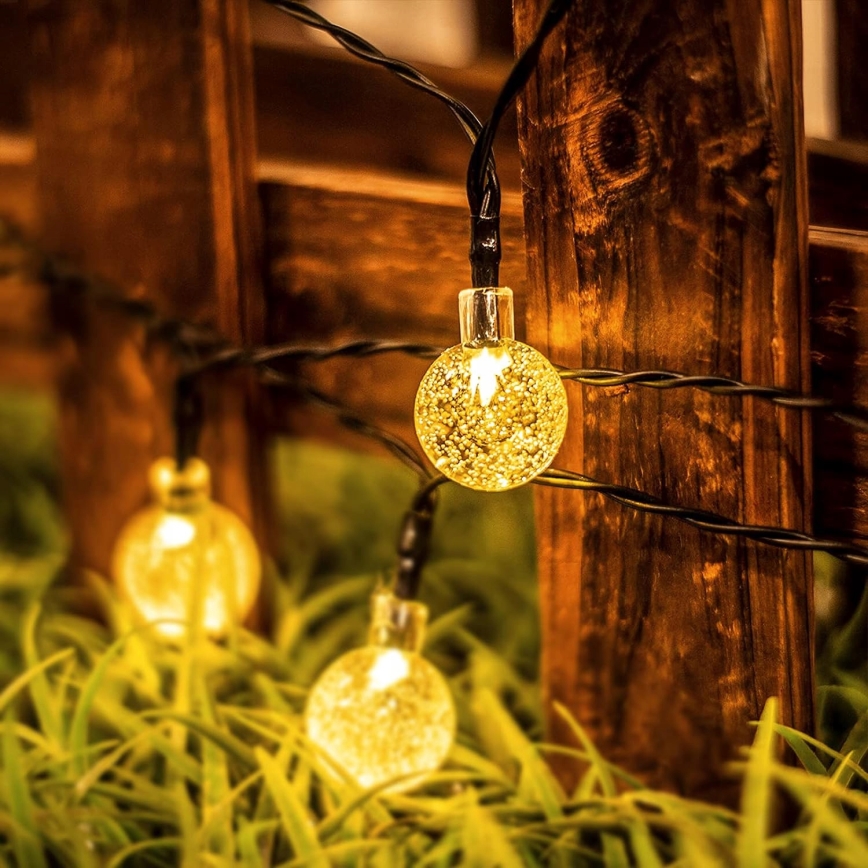 LED solarni dekorativni lanac 50xLED/8 funkcija 500 mAh 9,5 m IP67 topla bijela