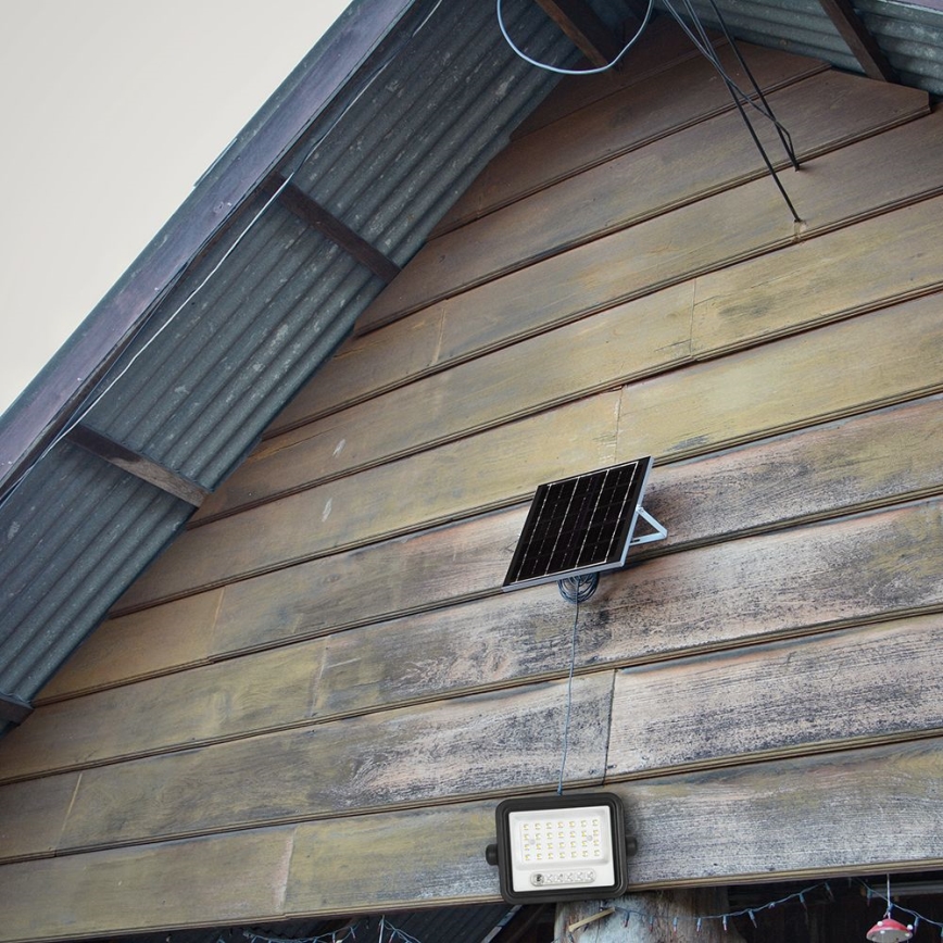 Solarni LED reflektor s mogućnošću prigušivanja LED/50W/3,2V 2000-8000K IP65 3800 mAh crni + daljinski upravljač