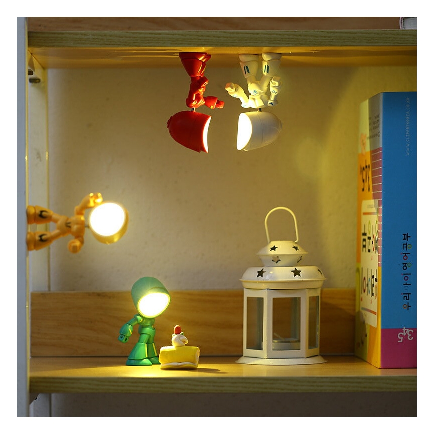 LED stolna lampa LED/0,06W/3xLR41 robot žuta