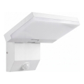 LED vanjska zidna svjetiljka s detektorom pokreta LED/18W/230V IP44 bijela
