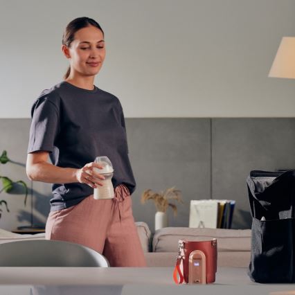 Lionelo - Punjivi grijač za bočice THERMUP GO EVO 18W/5V ružičasti