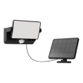 Philips - LED solarni zidni reflektor s senzorom FYNS LED/8,2W/3,7V 2600 mAh 3000K IP44 crna
