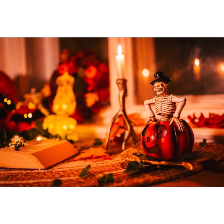 LED Dekoracija HALLOWEEN LED/2xLR44/topla bijela kostur u bundevi smola