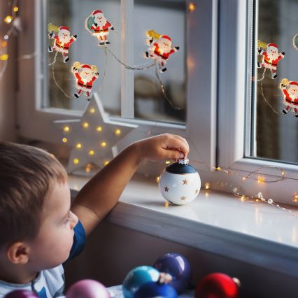 LED Božićni svjetlosni lanac s usisnim čašicama 6xLED/2xAA 1,2m topla bijela djed Božićnjak