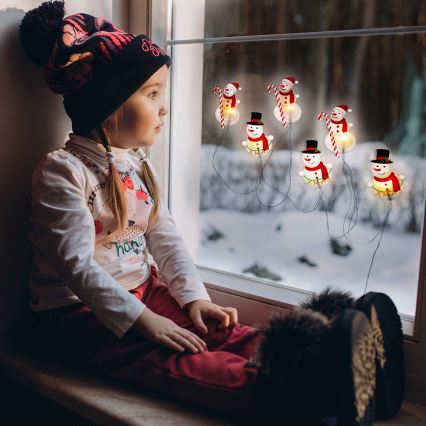 LED lanac s prianjaljkama 6xLED/2xAA 1,2m topla bijela snjegović